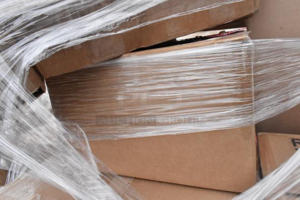 Pallet of boxed scratch and dent items, wrapped in plastic. Contents include butane range, casters, plates, trays.