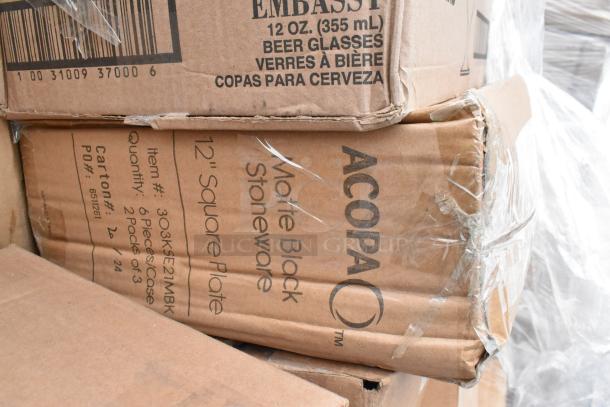 Boxes labeled "ACOPA Matte Black Stoneware 12'' Square Plate" and "Embassy 12 oz Beer Glasses," with minor box damage.