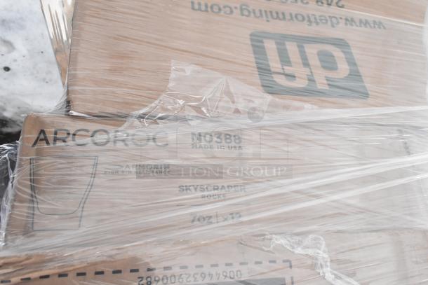 Sealed box of Arcoroc brand items, labeled "Skyscraper Rocks," featuring high rim resistance. Marked “Made in USA.”