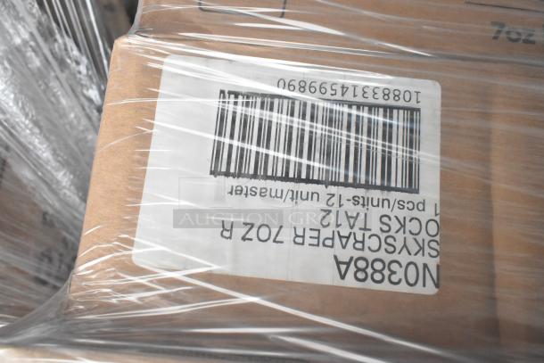 Cardboard box wrapped in plastic with visible barcode and markings. Label reads "12 units" and "N0388A." Part of a scratch and dent auction.