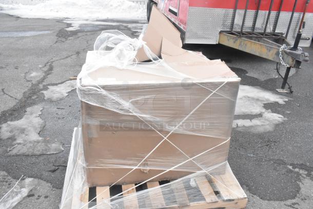 Packaged 600S1162018R sink with right drain board, marked brand new, visible in cardboard and plastic wrapping on a pallet.