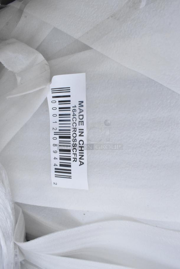 Barcode label reading "Made in China 164CCROSSCFR" on a white fabric surface.