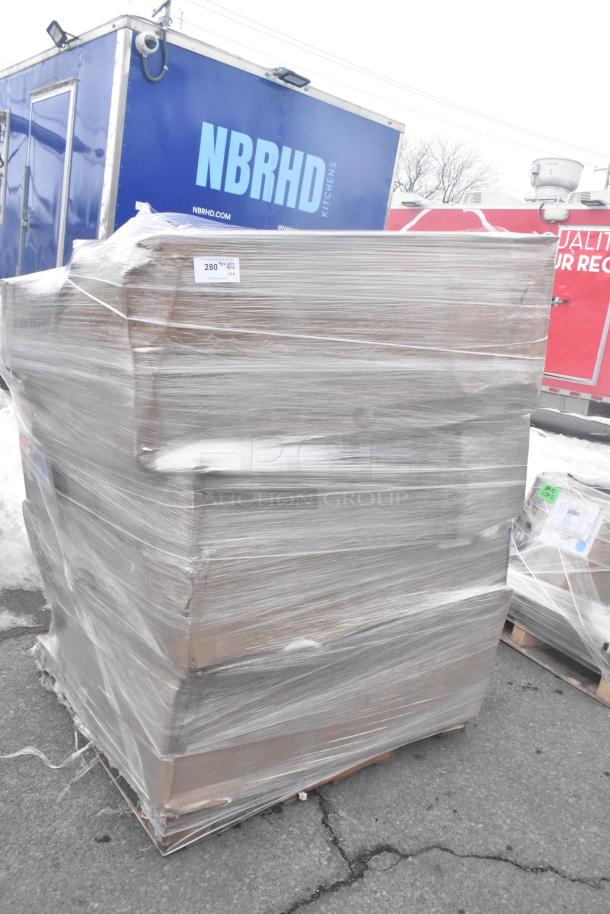 Pallet wrapped in plastic containing 10 brand new scratch and dent items, including chair and hand sink; minor packaging wear.