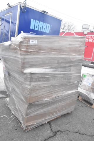 Pallet wrapped in plastic containing 10 brand new scratch and dent items, including chair and hand sink; minor packaging wear.