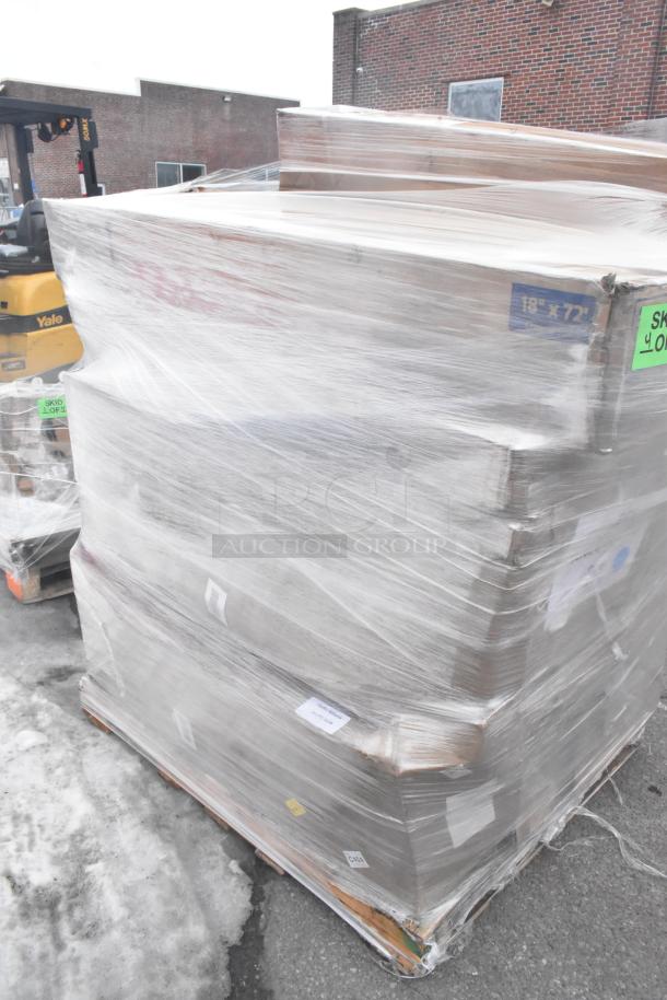 Pallet of 10 brand new scratch-and-dent items wrapped in plastic, including a chair and hand sink. Marked "18"x72"".