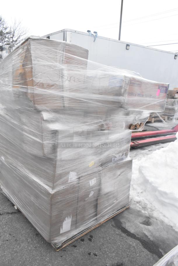 Pallet of 10 scratch and dent items including chair and hand sink, wrapped in plastic, Steelton label visible.