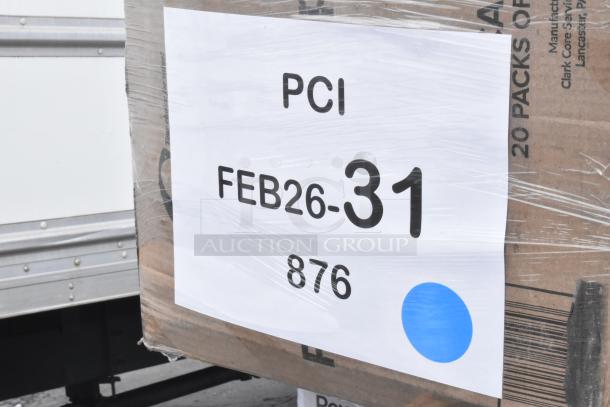 Box with shipping label reading "PCI FEB26-31 876" and blue dot, wrap-sealed, contains scratch and dent items.