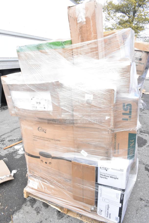 Stack of sealed boxes on a pallet, labeled "Choice Paper Soup Hot Food Containers" and "Choice Medium Weight Sporks." New, scratch and dent condition.