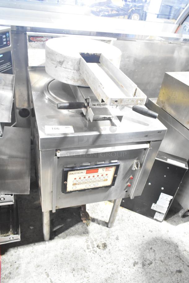 Commercial floor-style pressure fryer, stainless steel, digital controls, used condition with visible wear. Model: FASTRON.