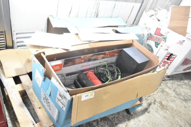 JBL B Series soundbar and speaker in open box. Includes accessories and original packaging. Visible labels with item codes.