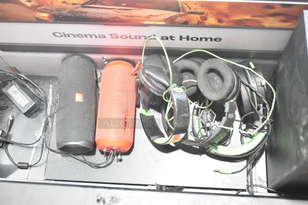 B Series soundbar and speaker set, includes black and red portable speakers with visible power cords, used condition.