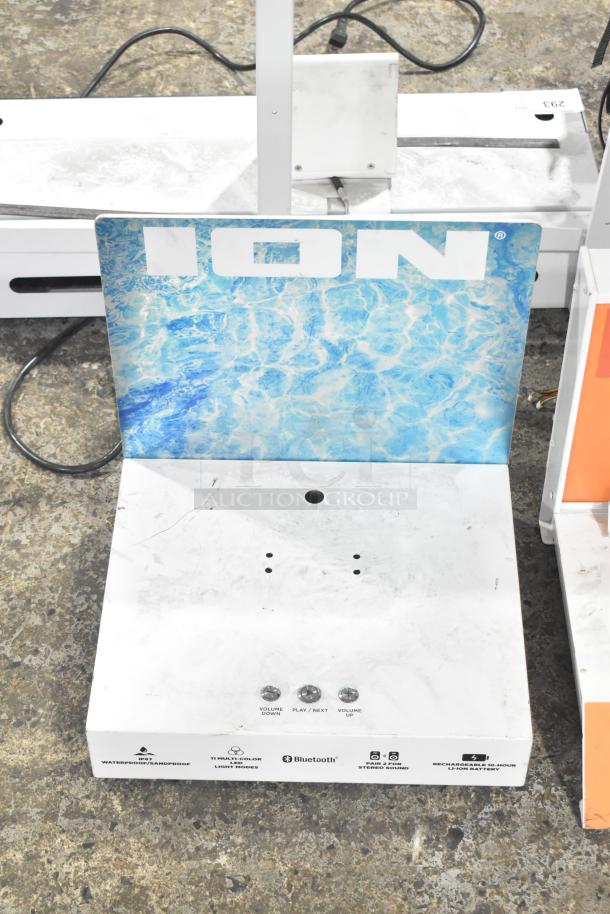 ION display stand with water pattern graphic. Features control buttons and Bluetooth, stereo, battery icons. Used condition.