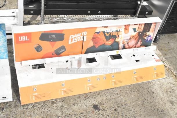 Three JBL display stands with promotional graphics, featuring product slots and buttons for models Xtreme 3, Pulse 5, Charge 5, Flip 6, Clip 4, and GO3. Condition appears used.