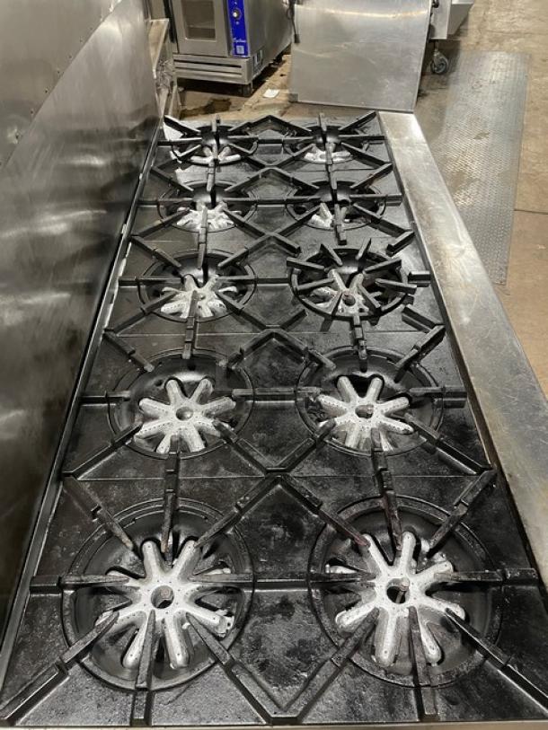 Garland H284 Commercial 10-burner range and double oven combo, stainless steel, natural gas, with backsplash, on casters.