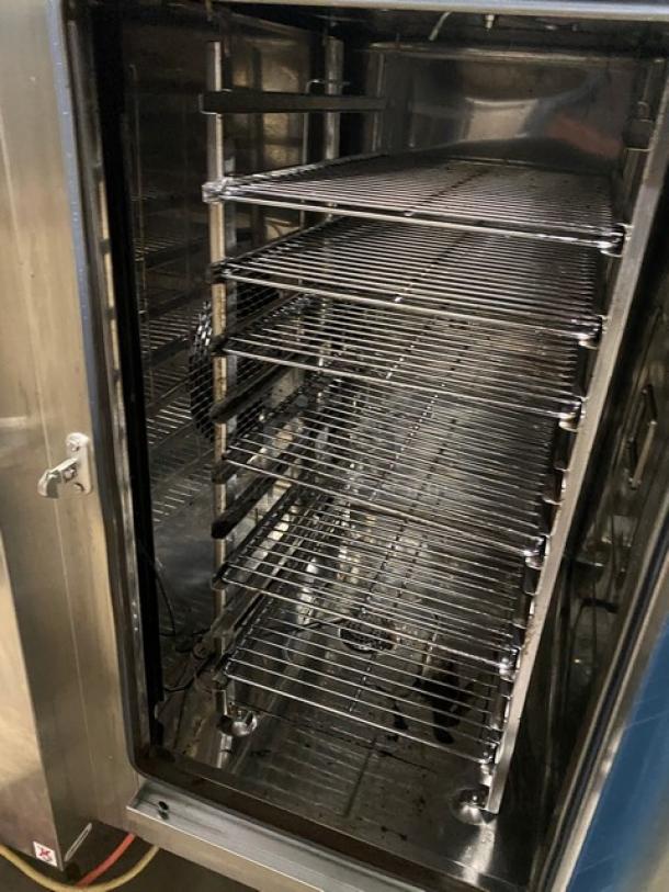 Rational ClimaPlus Series stainless steel combi steamer oven, double stacked, with built-in pan rack, Model CPC61/CPC101.