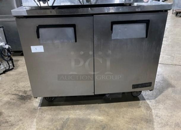 True Commercial 2-Door Worktop Refrigerator, Model TUC-48, stainless steel, poly coated rack, on casters, SN: 5113050.