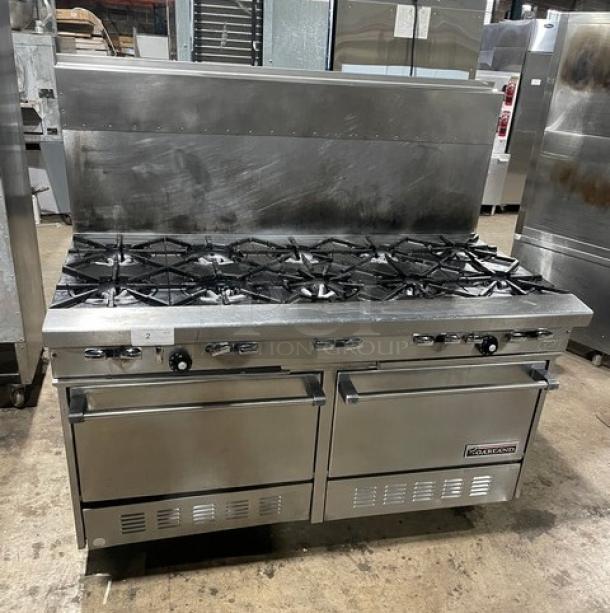 Garland commercial stainless steel 10-burner range with double oven, backsplash, and wired rack. Model H284 on casters.