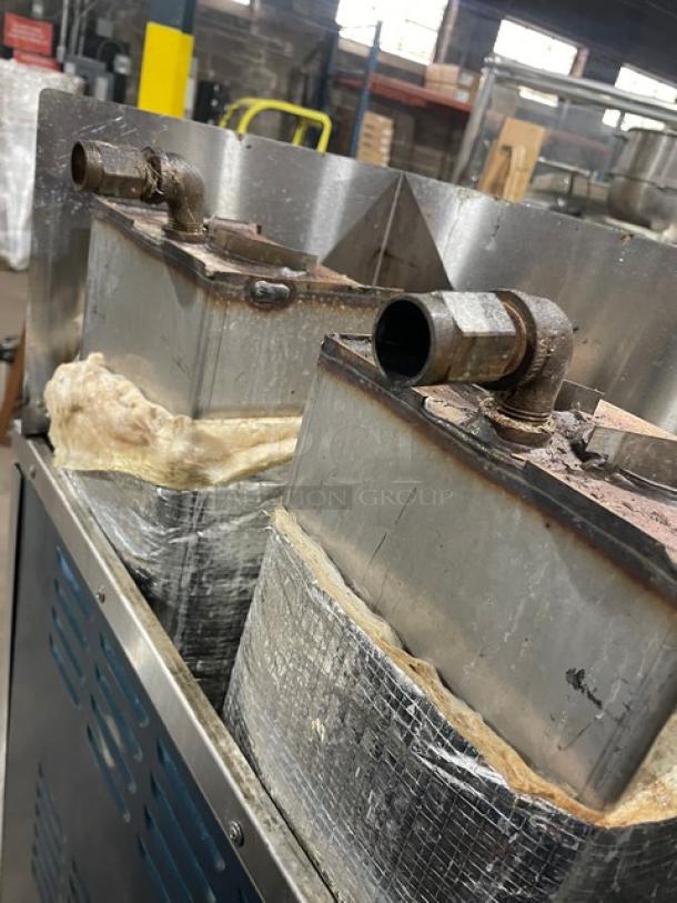 Cleveland Range 24CGA62S commercial convection steamer, dual compartments, natural gas, stainless steel, model 24CGA6.2S, on legs.