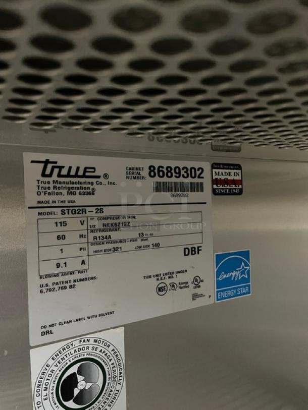 True STG2R commercial stainless steel 2-door refrigerator, Energy Star certified, serial number 8689302, 115V, on casters.