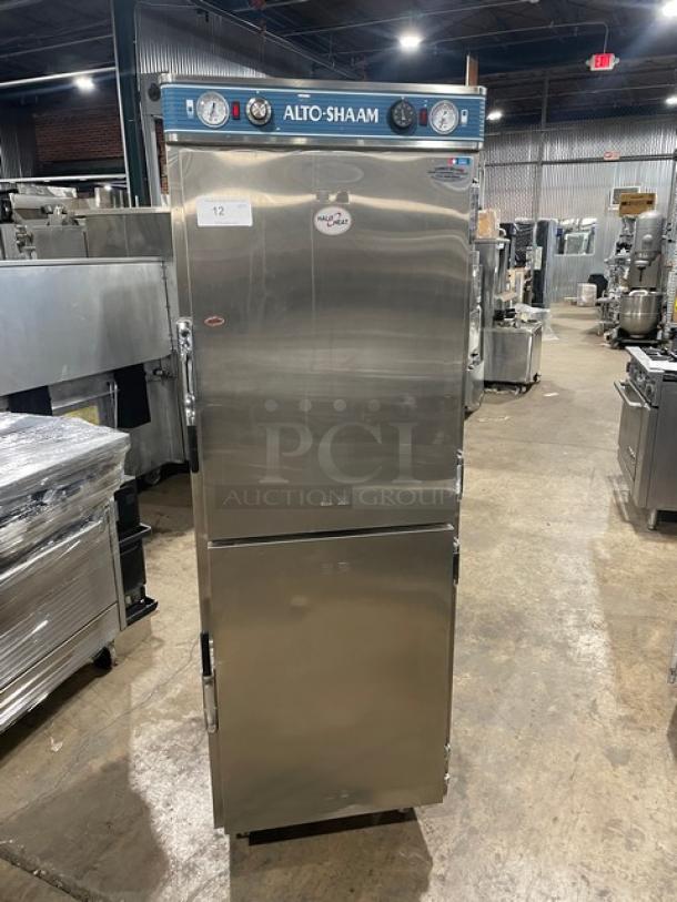 Alto-Shaam Halo Heat Series 1200-UP/SR stainless steel dual-compartment low-temp cabinet with dual controls, on casters, in good condition.