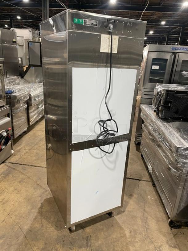 Alto-Shaam 1200-UP/SR commercial heated cabinet, stainless steel, dual-compartment, Dutch doors, on casters, electric, model number visible.