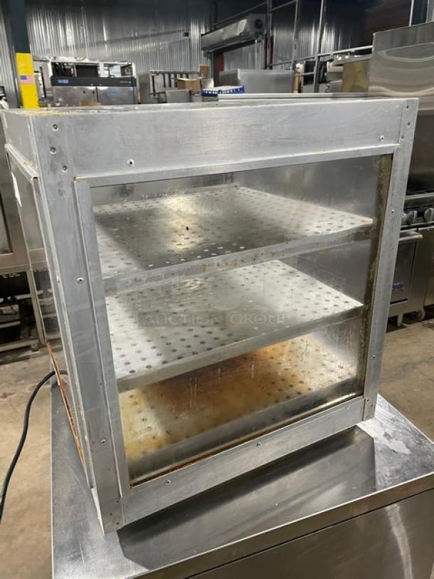HeatMax stainless steel countertop pizza/food warmer display case with shelves, on legs, used condition.