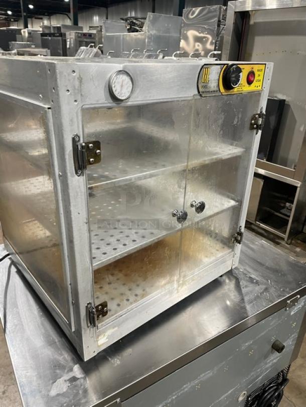 HeatMax Commercial Stainless Steel Countertop Pizza/Food Warmer Display Case with legs, visible temperature gauge, dual glass doors.