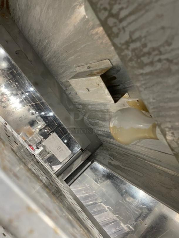 HeatMax stainless steel countertop pizza warmer, commercial display case. Visible interior light fixture, clean condition.