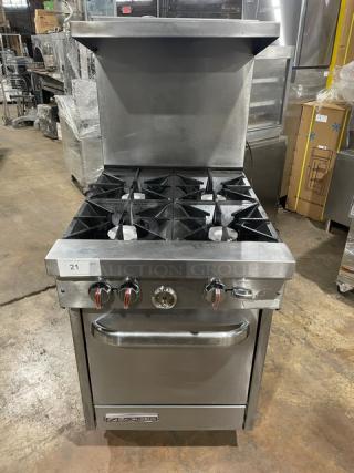 Southbend S241E commercial 4-burner stainless steel range/oven combo with salamander shelf, backsplash, and wired rack, on casters.