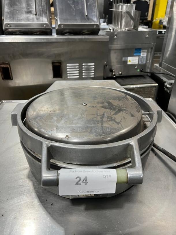 Caliente Industries A1 stainless steel electric tortilla press, commercial countertop model, visible wear, 115-125/208-240V.