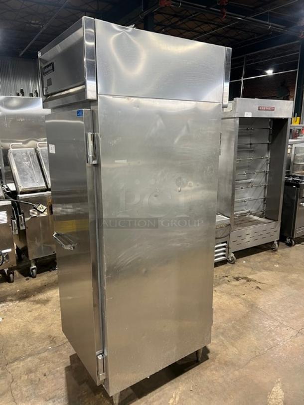 Continental DL1RE-PT stainless steel pass-thru refrigerator, single door, with built-in pan slide, on legs, model DL1REPT.