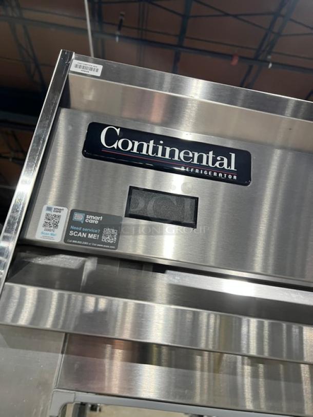 Continental Designer Line commercial stainless steel refrigerator, Model DL1REPT, single door, pass-thru, pan slide, SN 14738886.