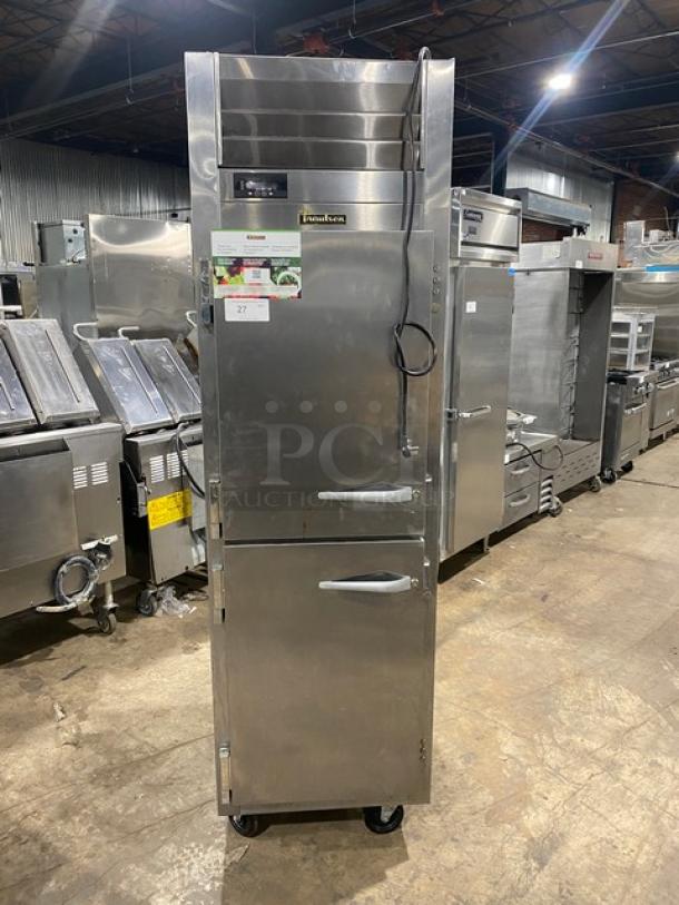 Traulsen stainless steel half door reach-in fridge, model AHT132DUTHHS, wired racks, on casters, 115V, commercial use.