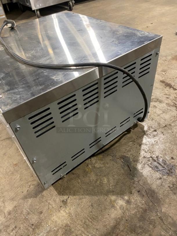 Asber AEPO Series commercial stainless steel electric countertop pizza deck oven, 220-240V, shows minor wear, vented sides.