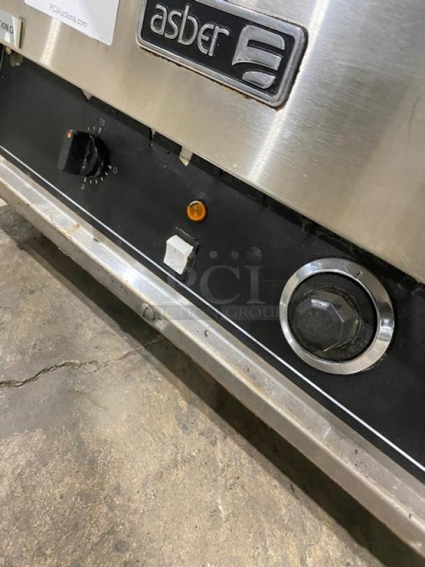 Asber AEPO Series stainless steel pizza deck oven, electric-powered, 220-240V, features control knobs, in used condition.