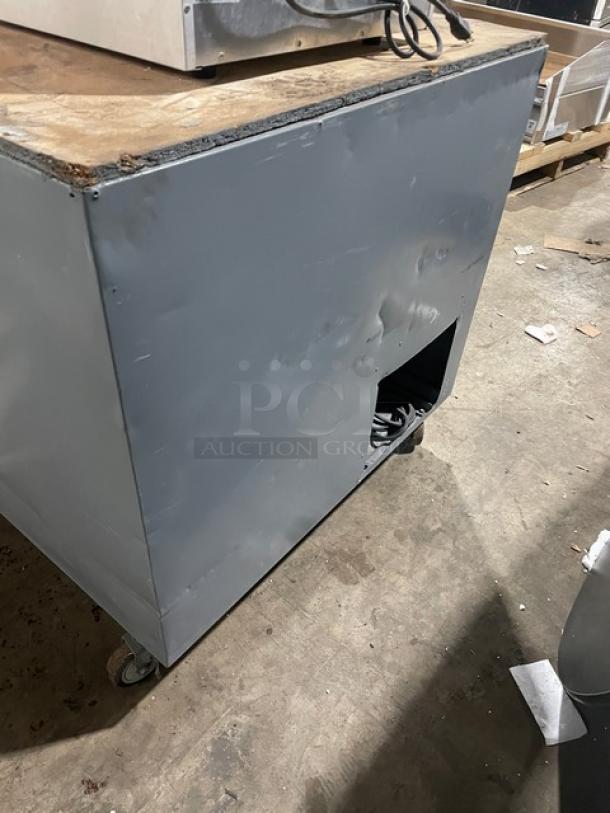 Leader DR48SC stainless steel 2-door pizza dough retarder table on casters, used condition, 115V, 1-phase.