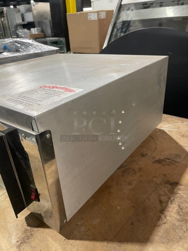 Otis Spunkmeyer OS-1 stainless steel countertop convection oven with 3 baking trays, SN: C0090295, 120V, in good condition.