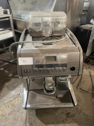 La Cimbali S39-Barsystem commercial espresso machine with stainless steel finish, clear hopper, steam wand, and control panel.
