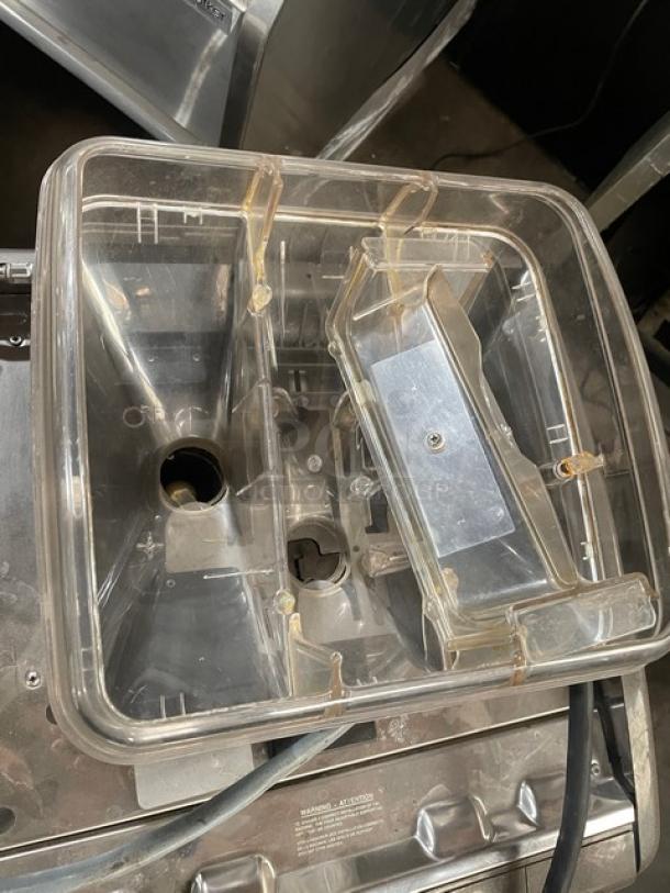 La Cimbali S39 espresso machine with stainless steel finish, clear polycarbonate hopper, and steam wand. Appears in used condition. 