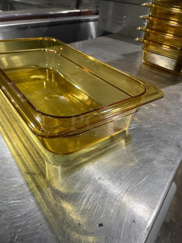 Cambro Commercial Amber High Heat 1/3-Size 2-1/2" deep food pan, new condition, stackable, durable amber plastic.