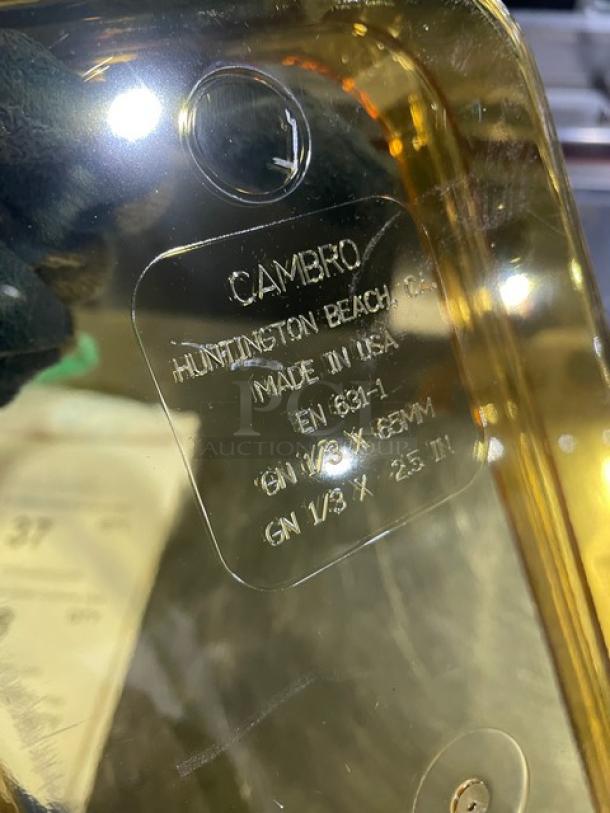 Cambro amber high heat 1/3-size food pan, 2-1/2" deep, new condition. Marked "Made in USA," EN 631-1 compliant.