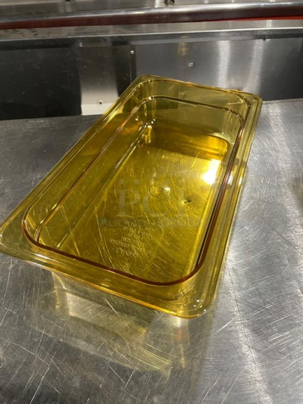 Cambro commercial amber high heat 1/3-size food pan, 2.5" deep, new condition, on stainless steel surface.