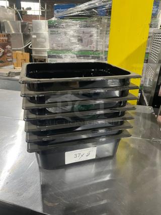 Rubbermaid Commercial black 1/2-size 4" deep insert pans, Model FG224P00BLA, stacked, new condition.