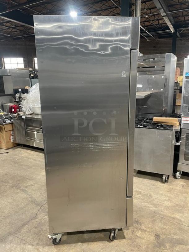 Arctic Air AR23E stainless steel reach-in refrigerator, single door, Energy Star certified, on casters, with poly-coated rack.