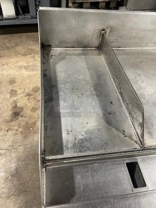 WoodStone stainless steel gas countertop split-top plancha griddle with back and side splash on legs, used condition.