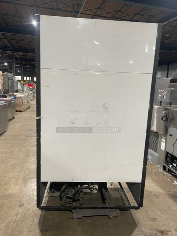 True GDM41 commercial refrigerator, black, double glass sliding doors, with pusher glide organizer, 115V 1 Phase, back view.