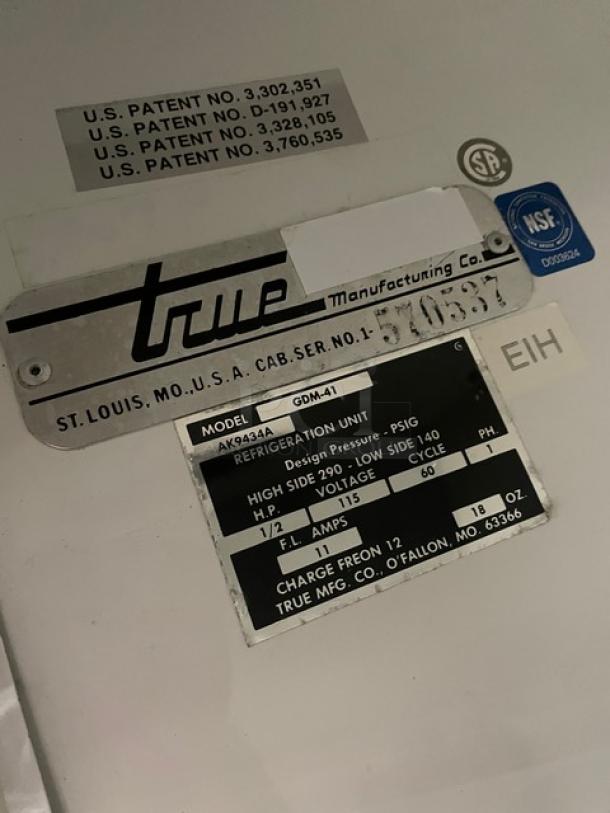 True GDM-41 commercial refrigerator label, showing model, serial number 570537, 115V, 1-phase, with NSF certification.