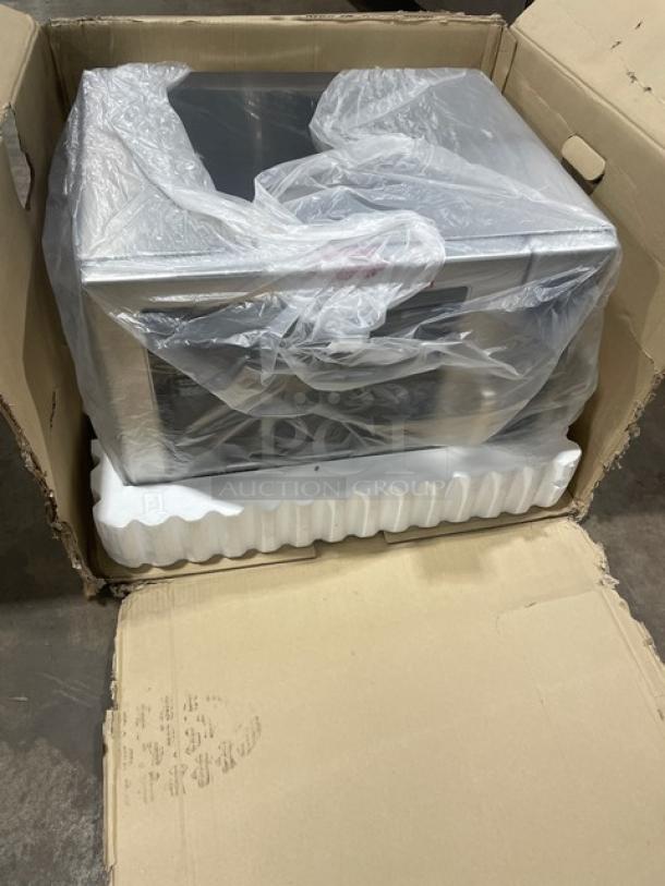 NEW Menumaster RFS12TSW stainless steel countertop microwave, digital controls. Packaged in original box, 120V.