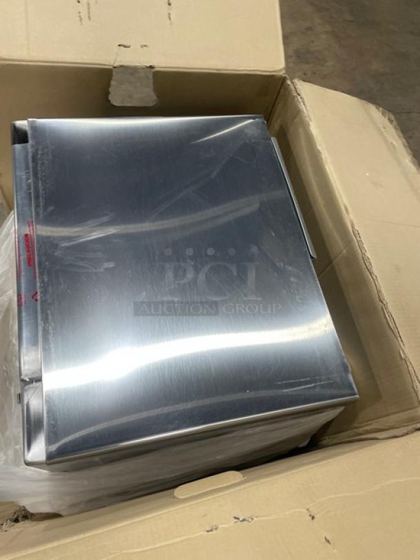 NEW Menumaster RFS12TSW stainless steel commercial countertop microwave oven in box, with digital controls. Model: RFS12TSW.