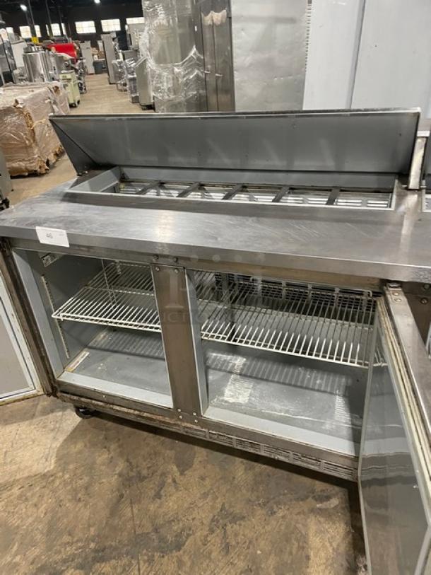 Beverage-Air SPE7218 3-door refrigerated prep table, stainless steel, Bain Marie style, poly rack, on casters, 115V, SN: 12103630.